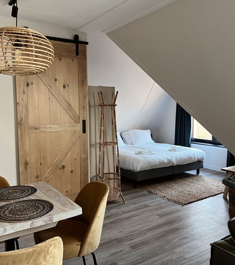 Slaapkamer in appartementencomplex Duno Lodges in Oostkapelle